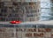 Lifebuoy under a stone bridge