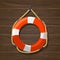 Lifebuoy. wooden background