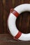 Lifebuoy on wooden fence