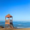 Lifeguard or baywatch wooden beach tower, cabin or hut