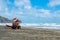 Lifeguard can seen standby on the beach to supervises the safety and rescue of swimmers and surfers in the Te Henga Bethells Beac