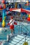 Lifeguard at a children`s splash pad on a cruise ship