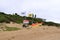 Lifeguard equipment in yellow and red colors and shark danger on the beach in Plettenberg Bay in South Africa