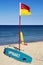 Lifeguard flag, surfboard and flotation device