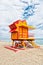 Lifeguard house on sand beach in miami, usa. Tower for rescue baywatch in typical art deco style. Wooden house on ocean shore on c