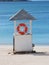 Lifeguard post on a beach facing blue sea