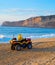 Lifeguard riding buggy beach Portugal