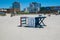 A lifeguard stand was seen on its side on the sand on a deserted Atlantic City Beach. Resorts and Hard Rock casinos are seen in