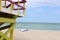 Lifeguard station and surfboard at beach