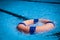 Lifeguard throw Life ring to save someone in swiming pool
