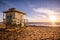 Lifeguard tower on one of the sandy Malibu beaches; beautiful sunset light; Pacific Ocean coastline, California