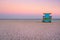 Lifeguard tower at South Beach in Miami with a beautiful sunset sky