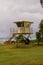 Lifeguard tower under a cloudy sky on the windy Lydgate Beach on Kauai