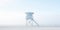 Lifeguard Tower in a white mist on a beach of seaside. Lonely landscape with watchtower. Generative AI