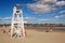 A lifeguard watches over a small crowd