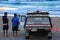 Lifeguards with vehicle at beach