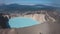 A lifeless acid lake in the caldera of an extinct volcano.