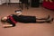 Lifeless business woman lying on the floor