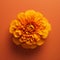 Lifelike Marigold: Aerial View Of A Stunning Flower On Orange Background