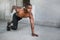 Lifestyle of an african american sprinter, preparing and training for track race, urban city fitness and exercise, copy space