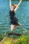 Lifestyle Concept and Ideas: Blond Woman in Dress Jumping N