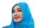 Lifestyle isolated portrait of young beautiful and happy Asian woman smiling covered by muslim hijab head scarf in islamic culture