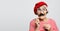 Lifestyle and people concept: funny grandmother with fake mustache and glasses. Copy space.