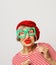 Lifestyle, people and party concept: funny grandmother wearing red clothes holding falce glasses