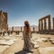 lifestyle photo iran Persepolis ruins with woman looking