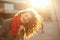 Lifestyle portrait of merry brunette lady with wavy hair wearing