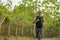 Lifestyle portrait of young attractive and healthy man on his 30s or 40s running on country road doing jogging workout training