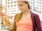 Lifestyle portrait of a Young beautiful girls tourist standing smile while having fun and looking at cell phones