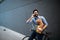 Lifestyle, transport, communication and people concept . Young man with bicycle and smartphone on city street