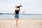 lifestyle woman young running ocean sea summer smile beach sunset travel
