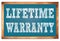 LIFETIME WARRANTY words on blue wooden frame school blackboard