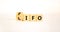 LIFO or FIFO last in first out symbol. Changed concept words LIFO to FIFO on wooden blocks. Beautiful white table white background