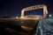 Lift bridge in Duluth Minnesota at night. Ice on the water, wintertime