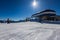 At a lift station in the mountains of the Dolomites. Skiers wait in line to take the cable car