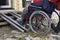 Lifting an invalid in a wheelchair in a country house