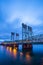 Lifting sectional truss Columbia Interstate bridge over the Columbia River with colorful evening lights