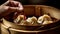 lifting soup dumpling from basket with chopsticks Generative AI