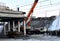 Lifting truck crane, dismantling a large reinforced concrete slab,