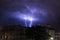 Lighning bolt over night sky in central Europe, Austria.