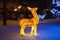 Light acrylic deer figure, reindeer Christmas decoration illuminated in winter city park