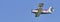 Light aerobatic biplane in close flight