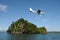 Light airlane landing on island
