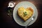 light appetizing potato pancakes in shape of heart for breakfast