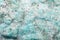 Light aquamarine stone background with microcracks