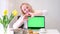 light background space for text advertising do with hands heart woman dancing near laptop with green screen desire to