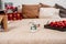Light bedroom with Christmas decorations, toys and gifts. Winter cozy style